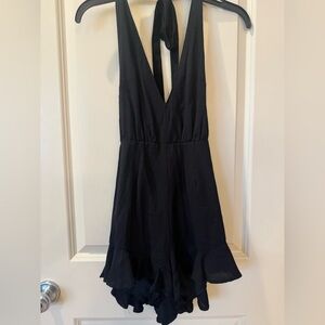 Black Sleeveless Ruffle Hem Romper